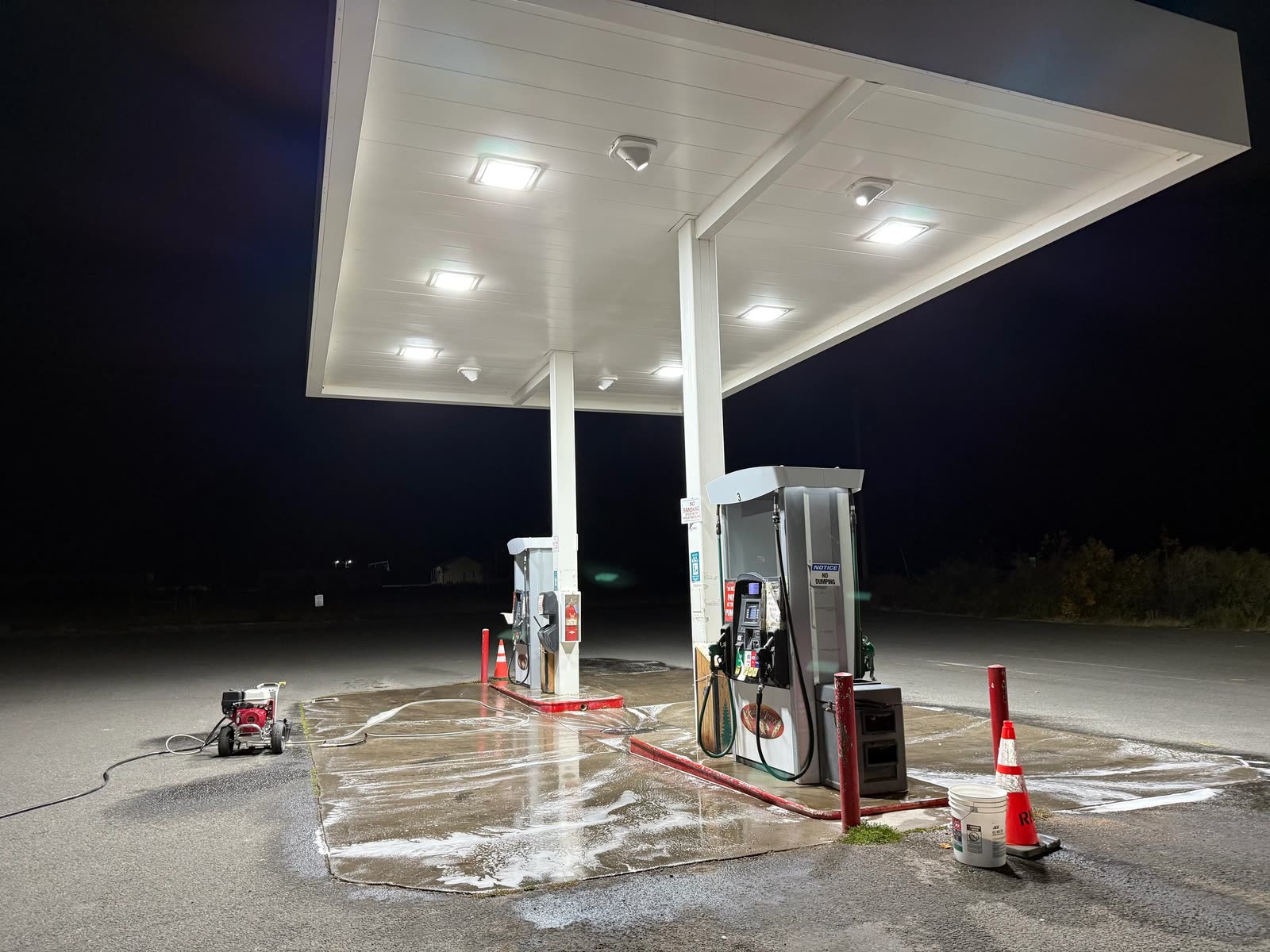 Commercial gas-station exterior cleaning in progress